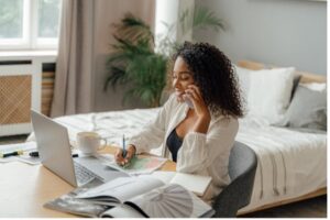 woman-on-phone-working-at-computer